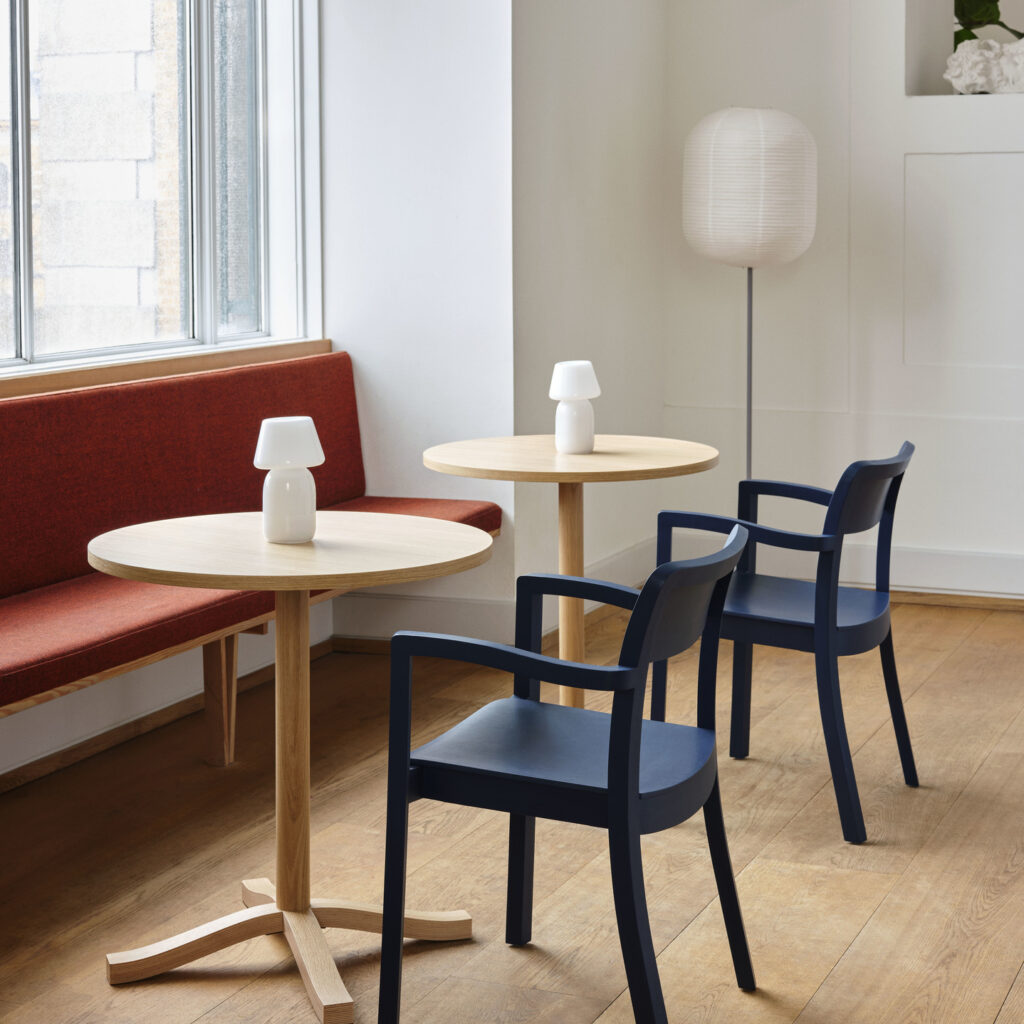 Pastis_Armchair_steel_blue_wb_lacquered_ash_Pastis_Table_dia70xH74_wb_lacquered_plywood_oak_Apollo_Portable